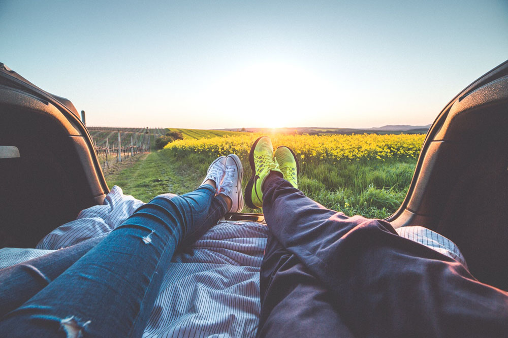 two people laying down and relaxing 