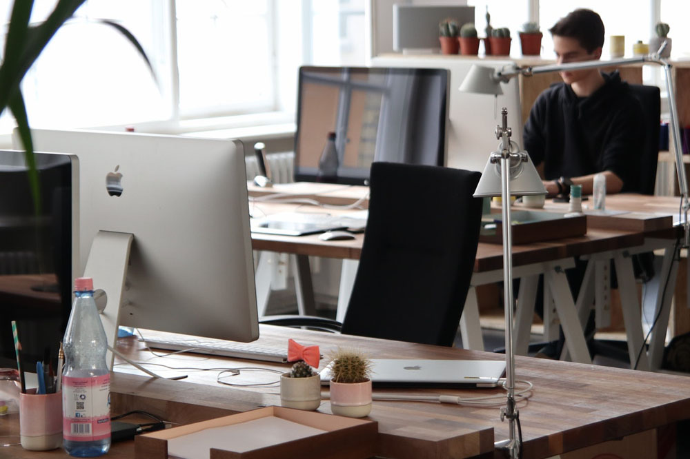man working on a desktop